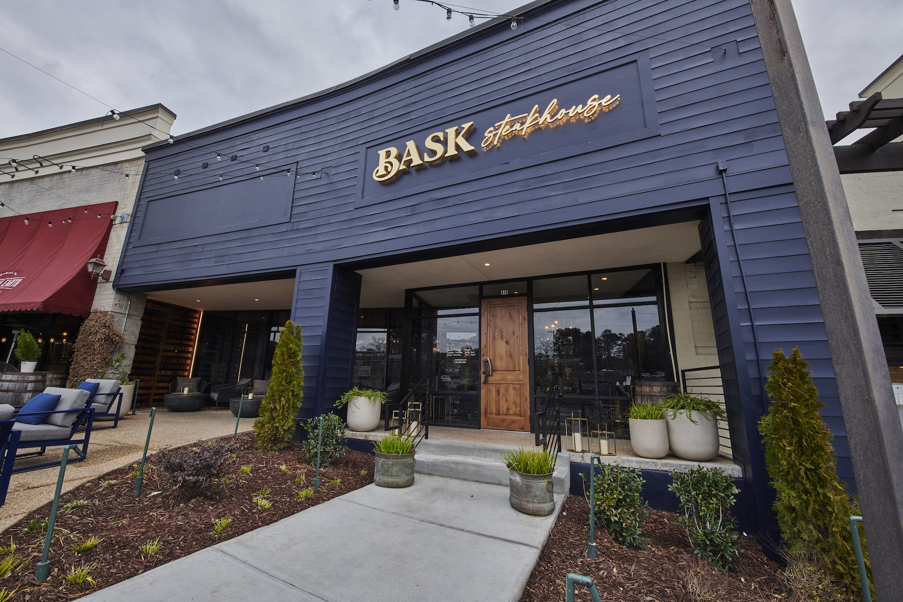 Once he started to miss wearing suits, he opened Bask Steakhouse next door. The two restaurants have different staffs and ser