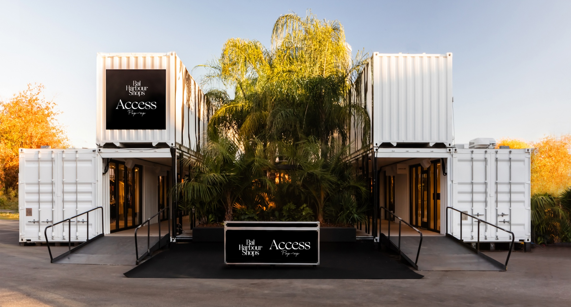 LOT-EK Architecture & Design came up with a simple black-and-white design for the shipping container storefronts, which w