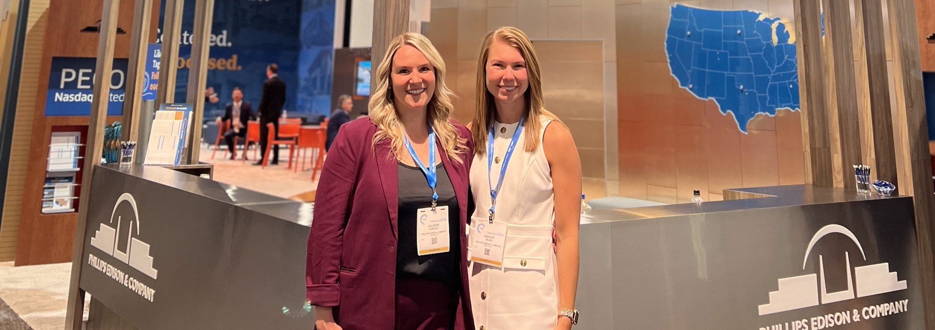 Phillips Edison & Co.’s Allison Lembright, left, and Ashley Selers, right, at the company’s booth at ICSC LAS VEGAS in Ma