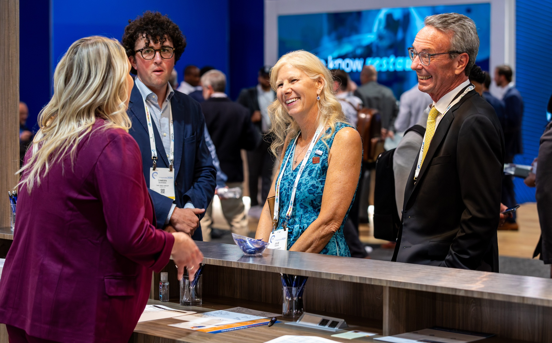 Lembright talks about the company with new connections at the company’s booth.