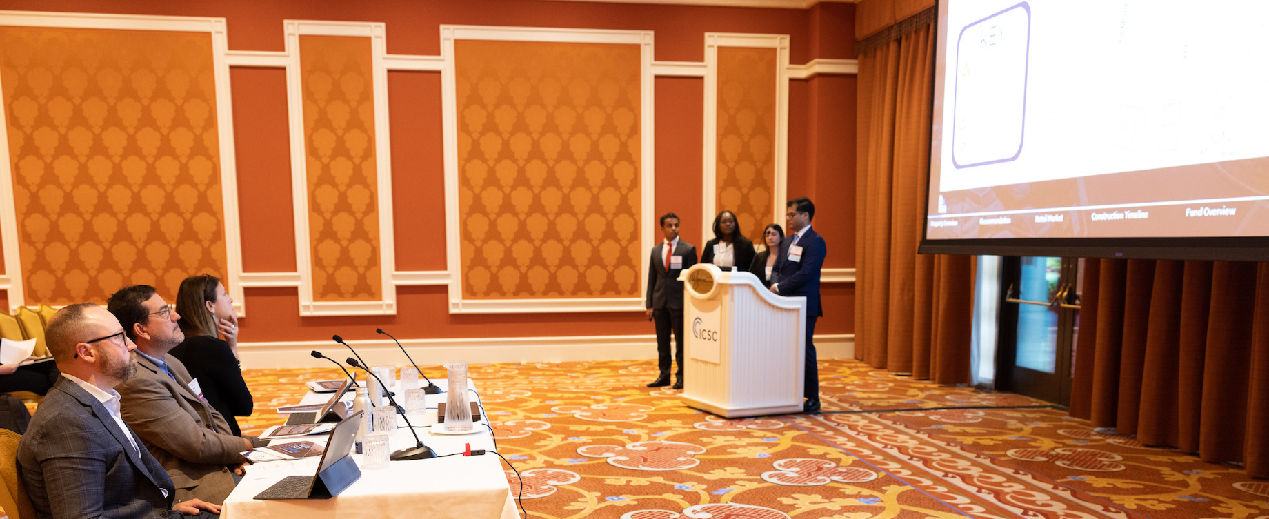 The preliminary rounds of the competition were held in three different rooms with different panels of judges. The teams prese