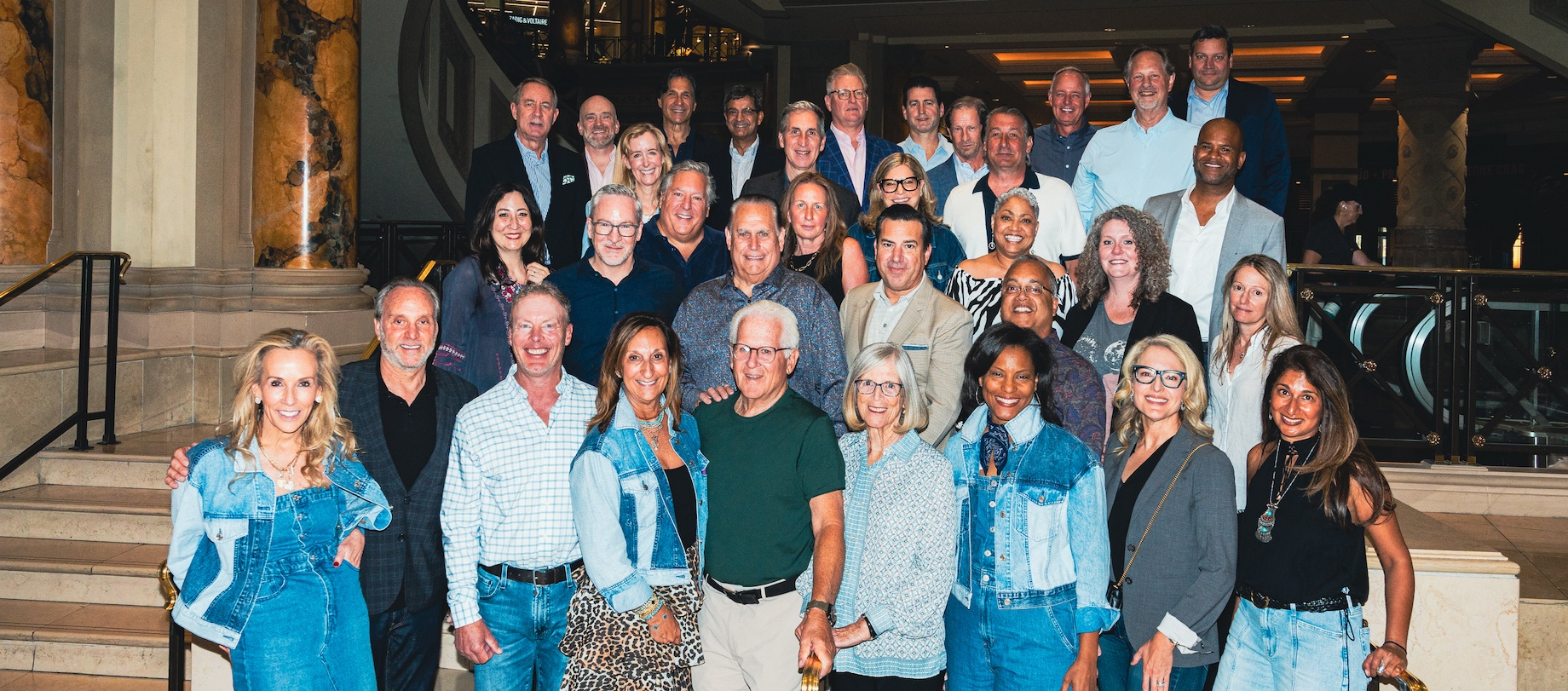 Gap Inc. real estate alumni gathered in Las Vegas in May to honor Alan Barocas, standing in the center of the front row. The 