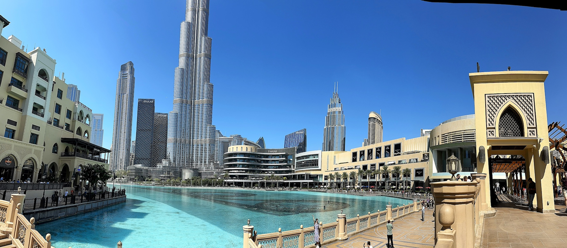 Dubai Mall’s Souk Al Bahar marketplaces offers views of Dubai Fountain and Burj Khalifa.