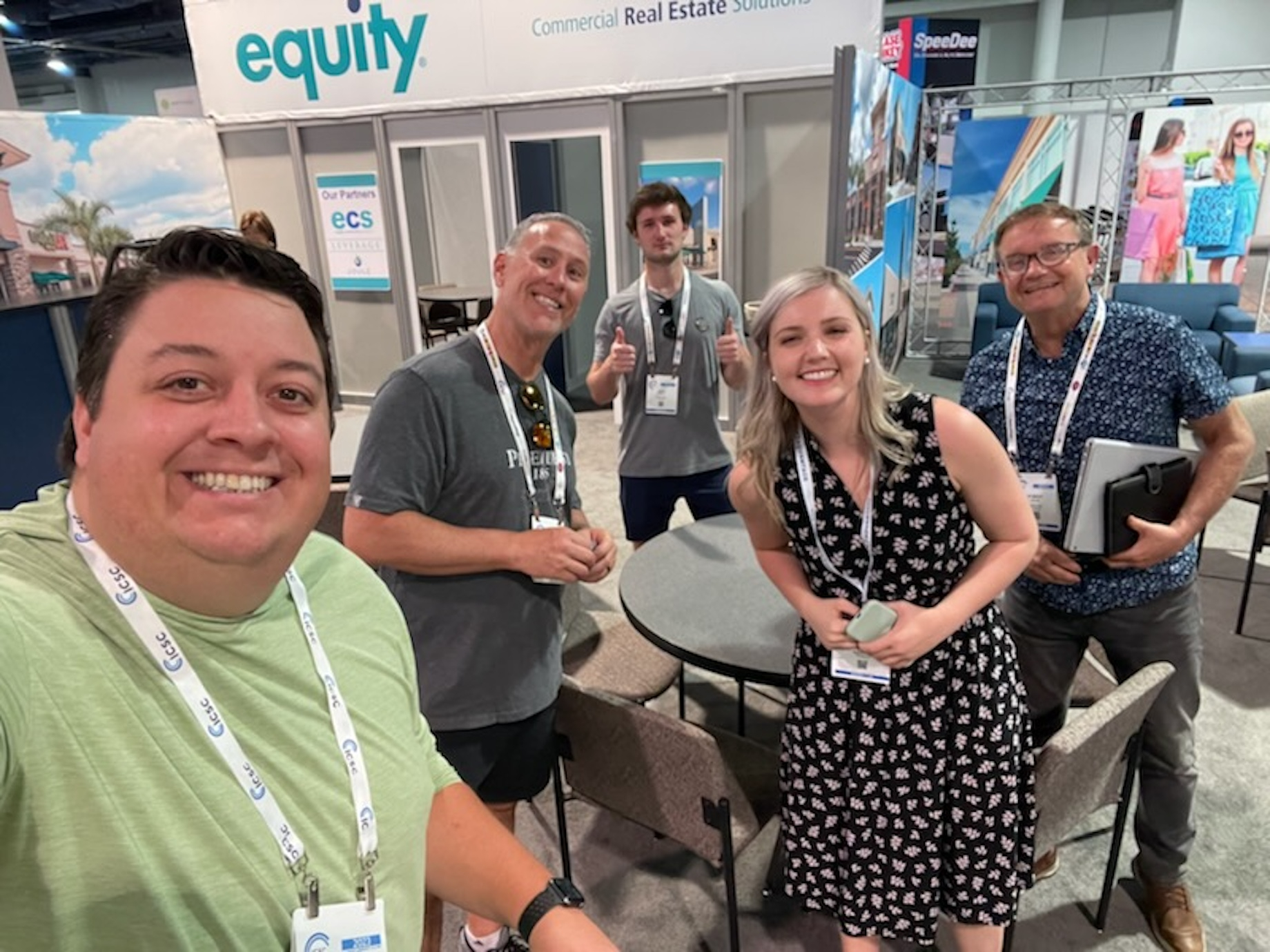 Bob Matias, at right, at ICSC LAS VEGAS in May 2023 with colleagues, from left to right, executive vice president of brokerag