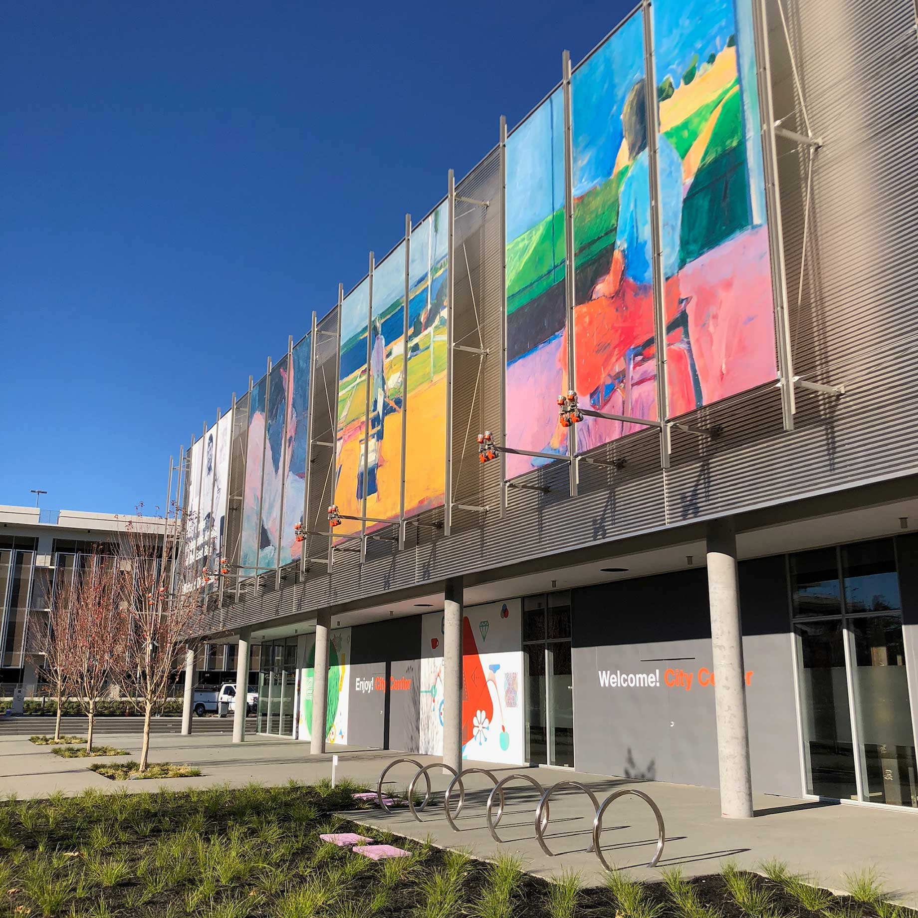 Some color helps this facade stand out from the grey steel and glass.