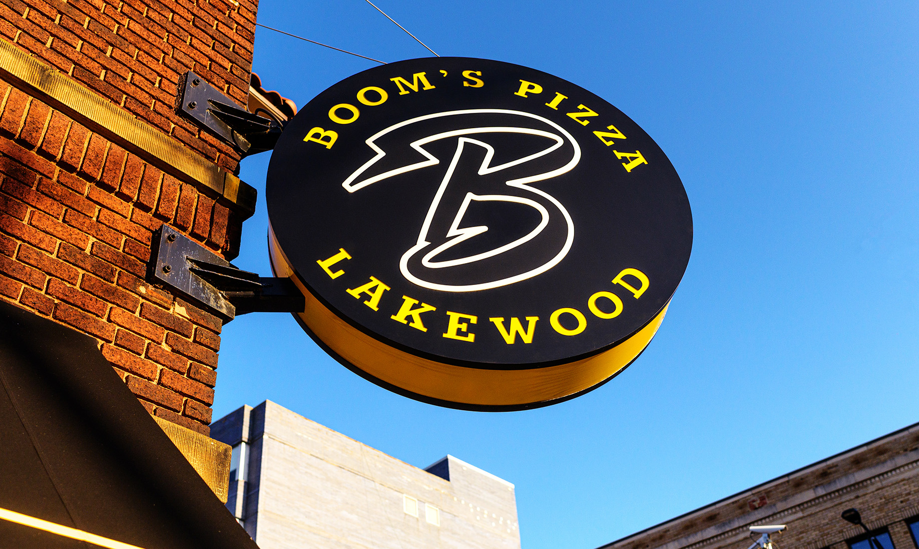 The sign outside the first Boom’s Pizza location in Lakewood, a Cleveland suburb. The fast-casual concept is named after chef