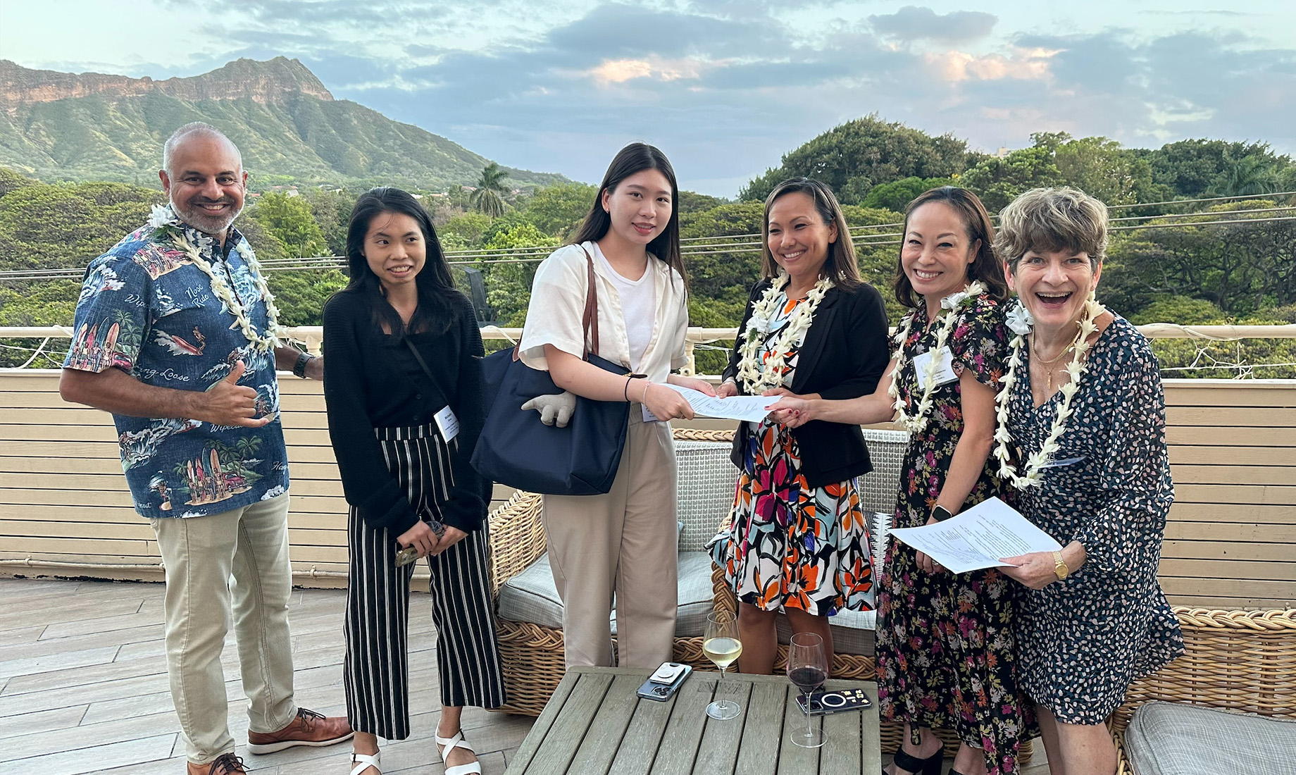 Sam Shenkus, at right, and Koa Project Management’s Jaz Nijjar, at left, connected with University of Hawaii students at an I