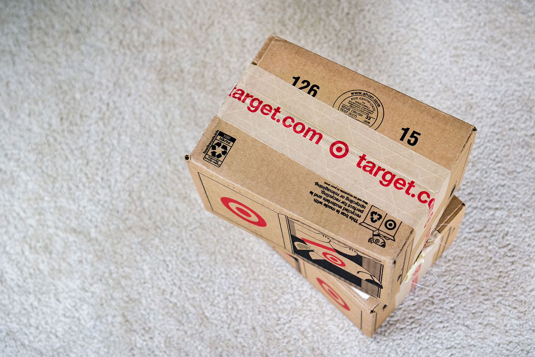 Target is providing free next-day delivery and a drive-up service that enables shoppers to order using an app and then to get