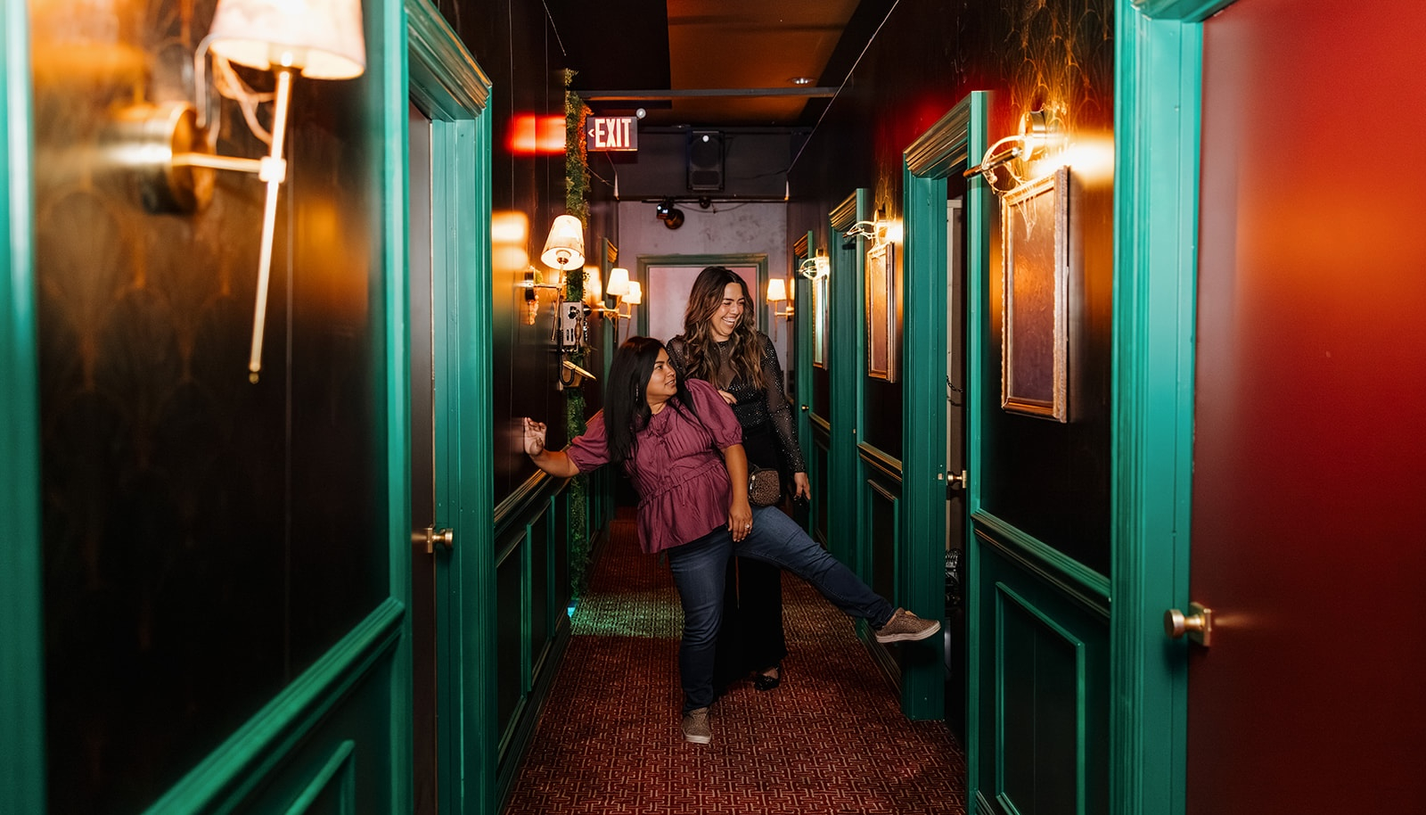 Visitors to The BooMont Hotel could open more than 40 doors. Behind one of them, at top, is a holographic figure who shared a