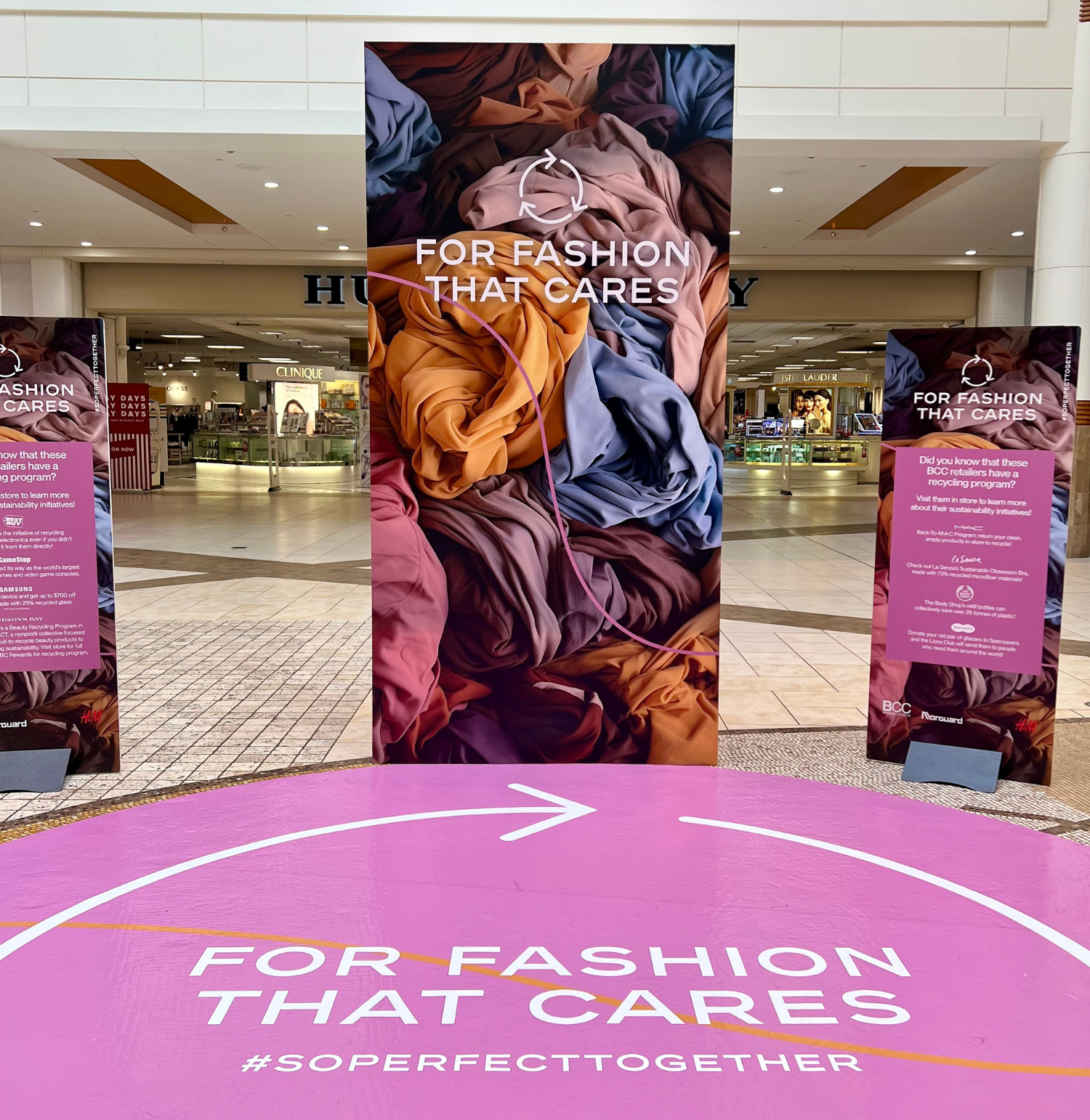 Signs promoting the For Fashion That Cares program, a partnership with Big Brothers Big Sisters of Ottawa, at St. Laurent Cen