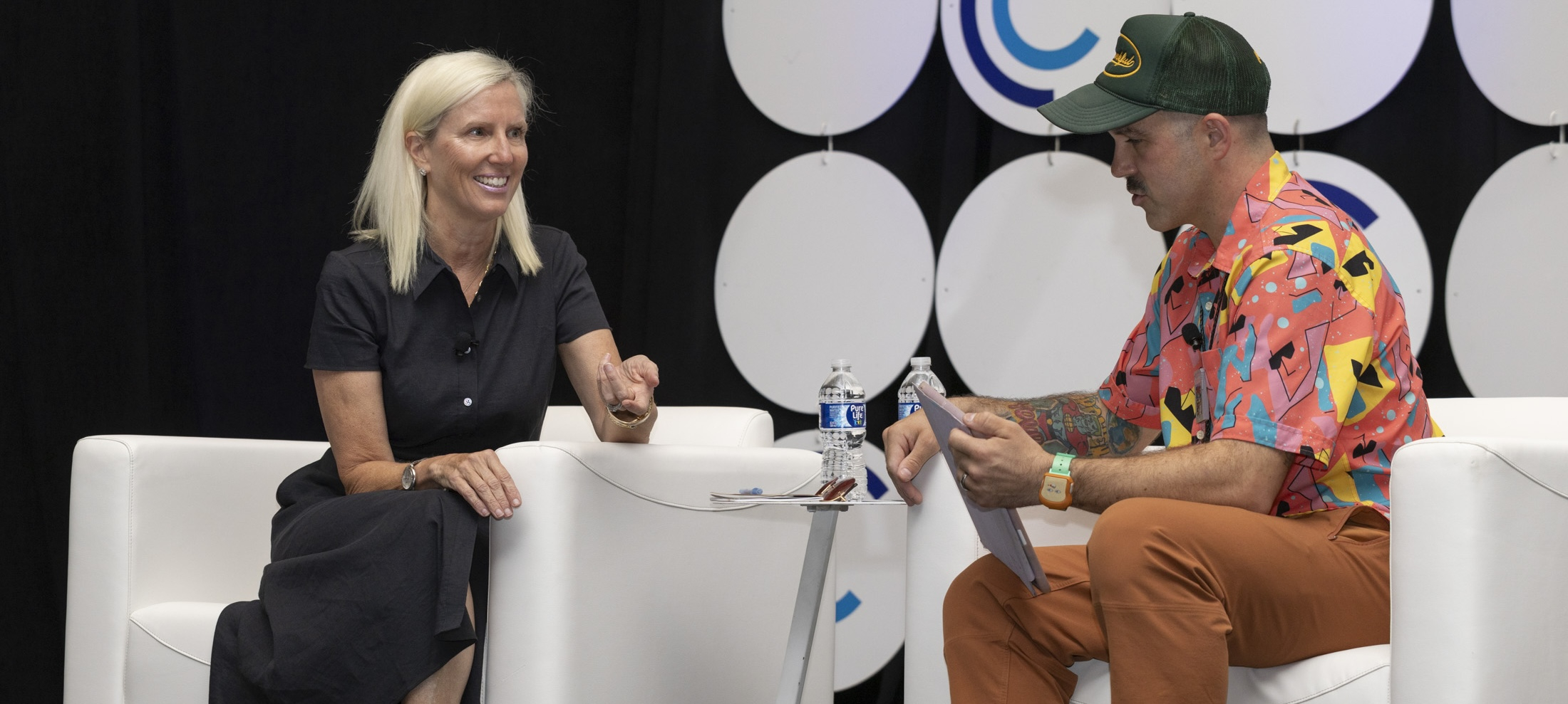Online brand marketing company Wrenegade Media’s Wade Holland, at right, moderated a keynote conversation with Edens’ Jodie M