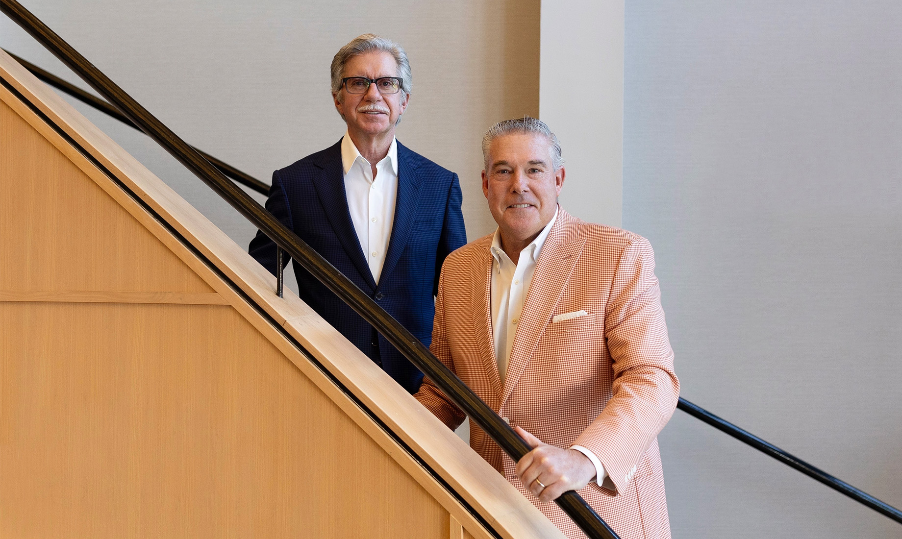 GBT’s president and chair George Tomlin, at right, and CEO Brian Dawson.