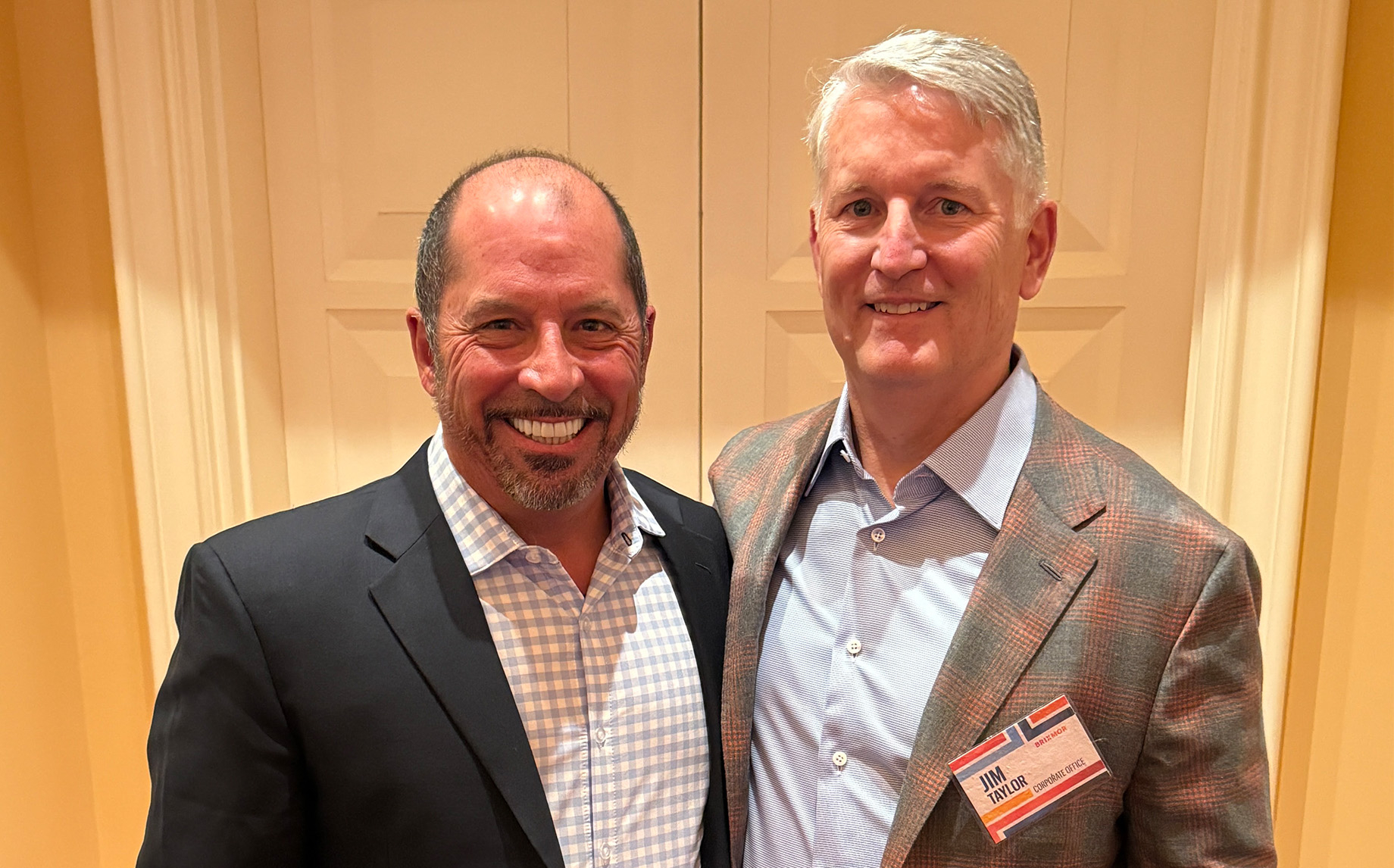 Taylor with current ICSC chair JP Suarez, at right