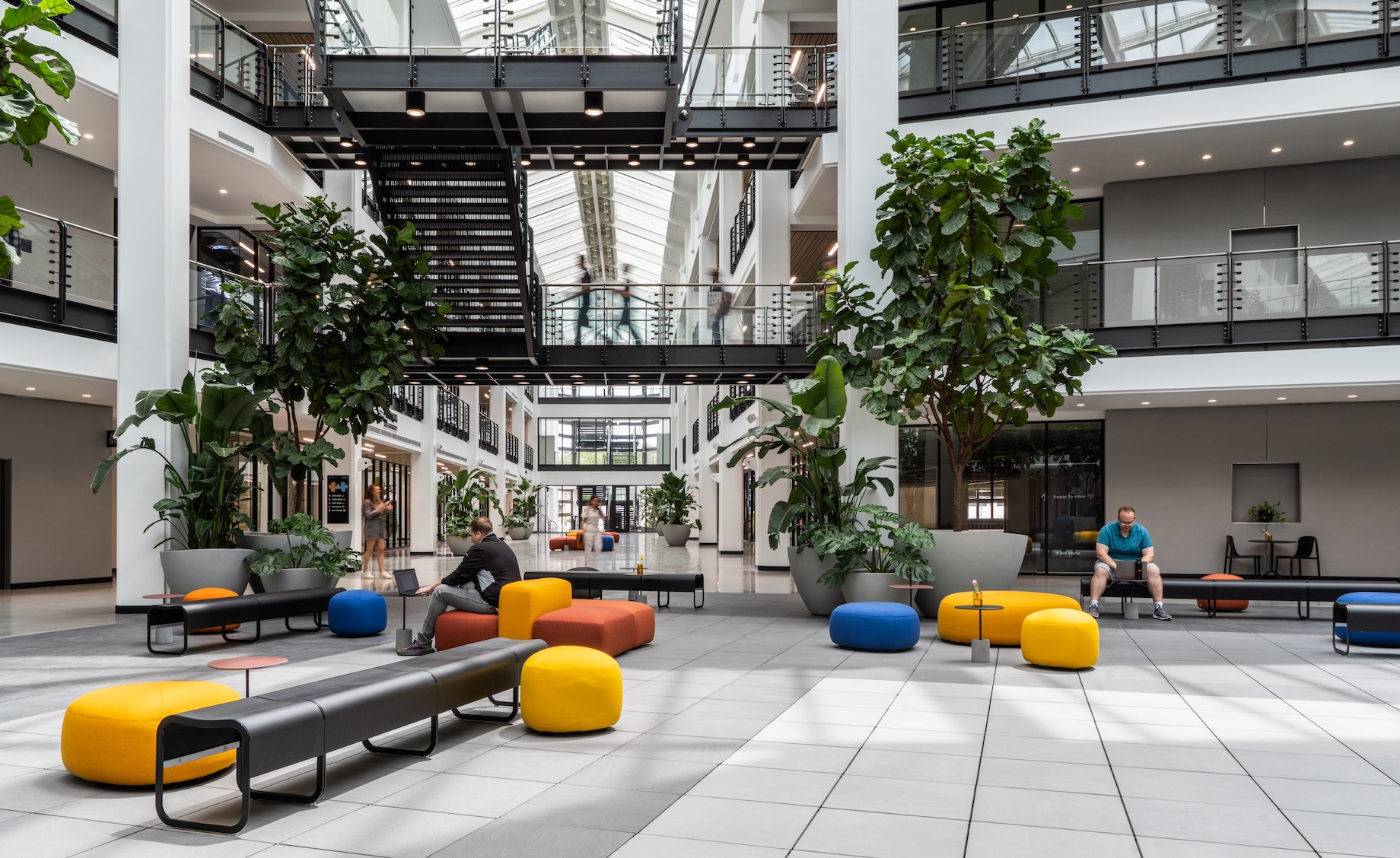 Natural light and splashes of color in common areas highlight the experience at Bell Works Chicagoland, a remake of the forme