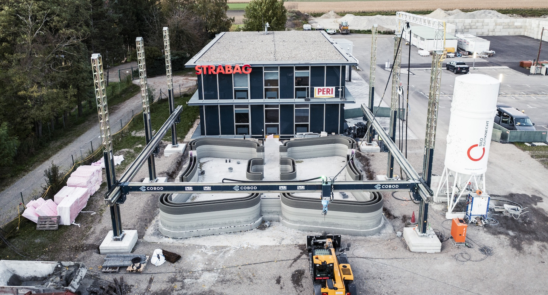 Peri 3D Construction’s gantry-style printer built this 1,345-square-foot office building in Hausleiten, Austria, in 2021. Con