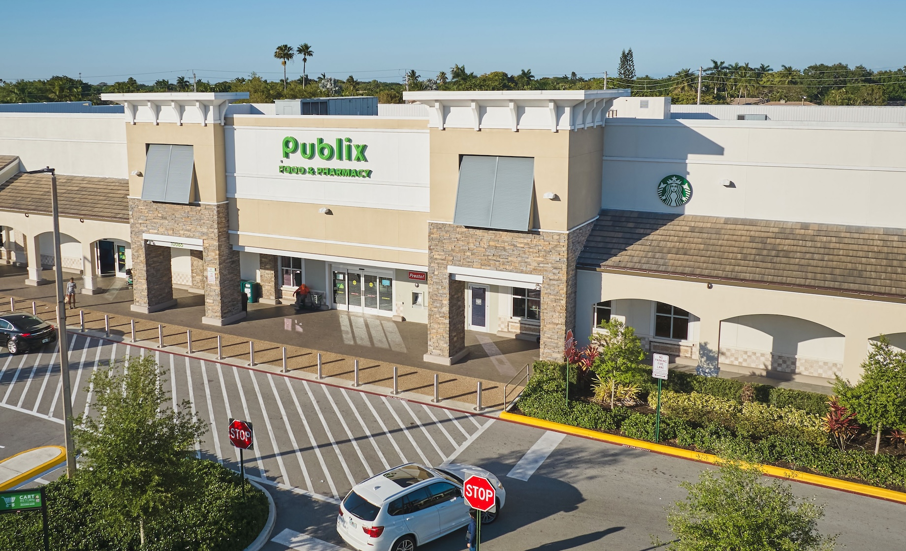 A joint venture on a buying spree has acquired Florida’s Plantation Promenade, above; New Tampa Center, at top; and eight oth