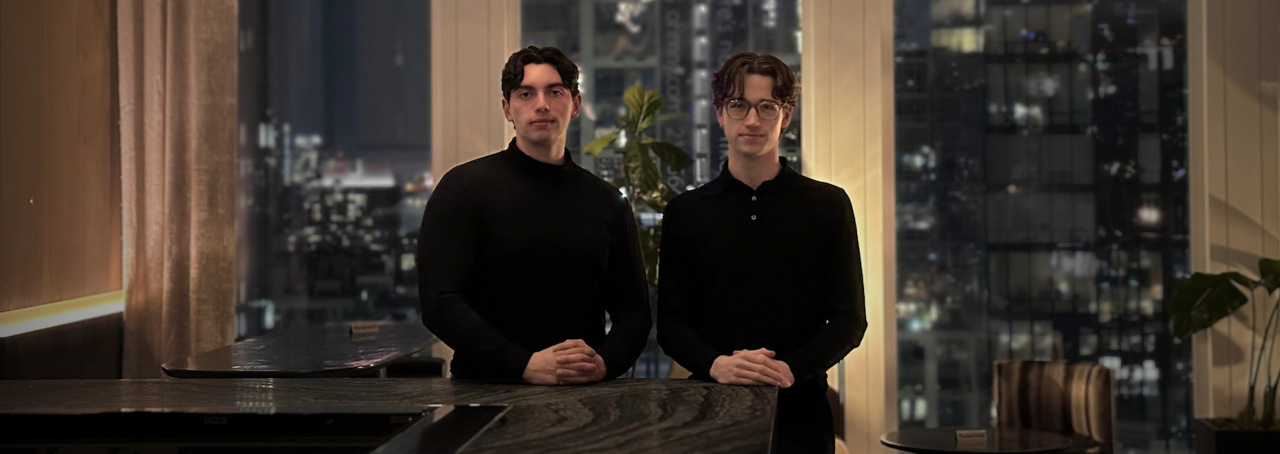 Prismera founders Nicolas Osborn, at left, and Riley Hudson, at right, at the New York City bar where they drummed up busines