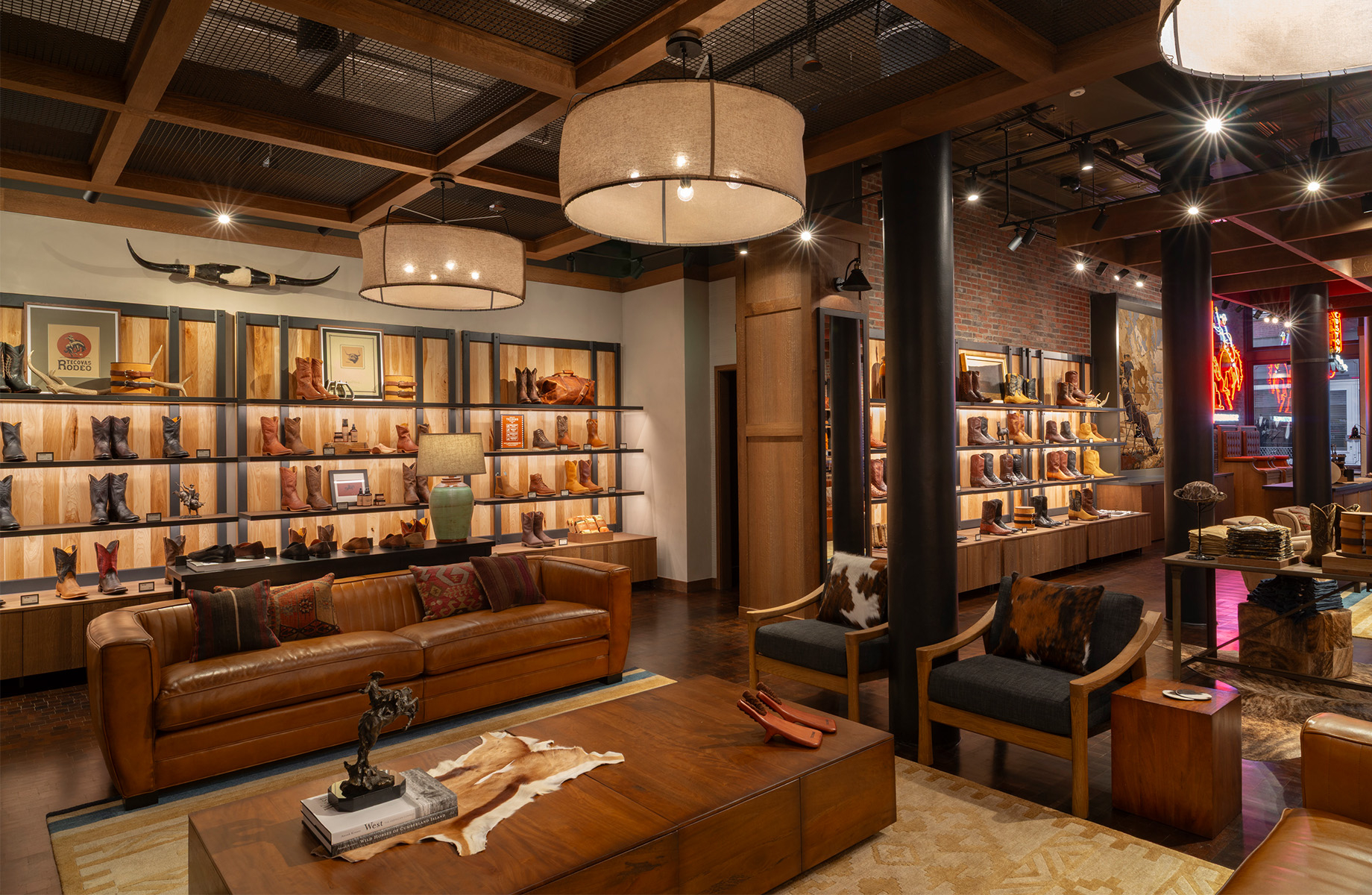 A central seating area anchors the store, encouraging visitors to pause, socialize and spend time in the space.