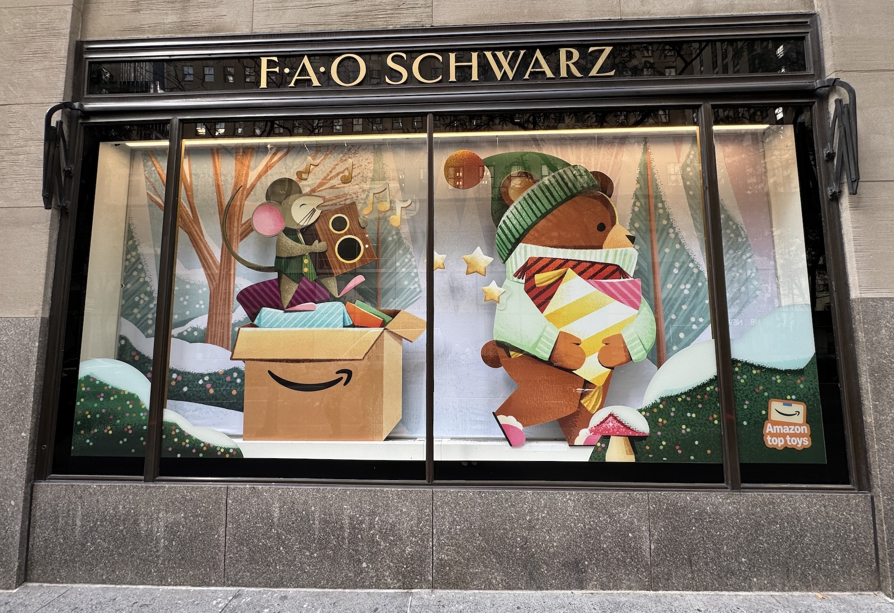To promote its new partnership with Amazon, FAO Schwarz decorated windows at its New York City flagship store with Amazon dis