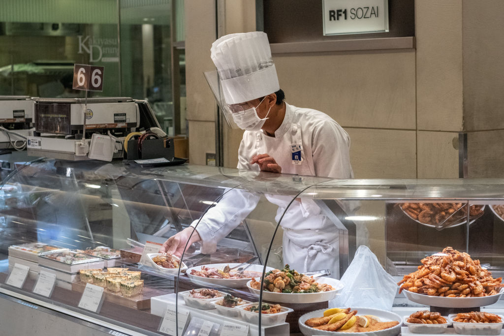 Employees who aren’t separated from customers via plastic screens wear both masks and face visors