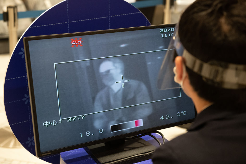 … who monitor each customer's temperature before the customer shops