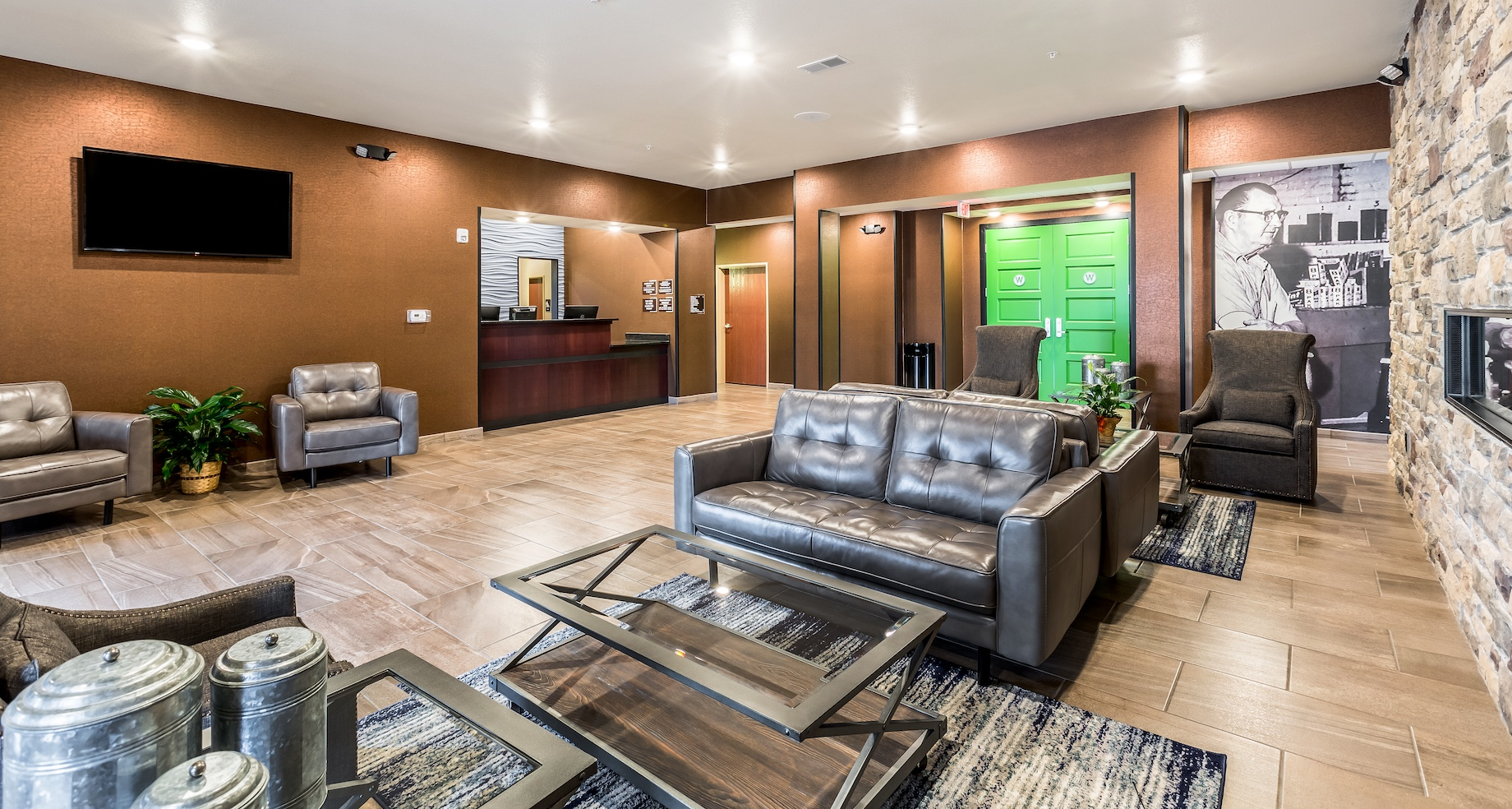 The restaurant is accessible through the hotel lobby’s green doors.