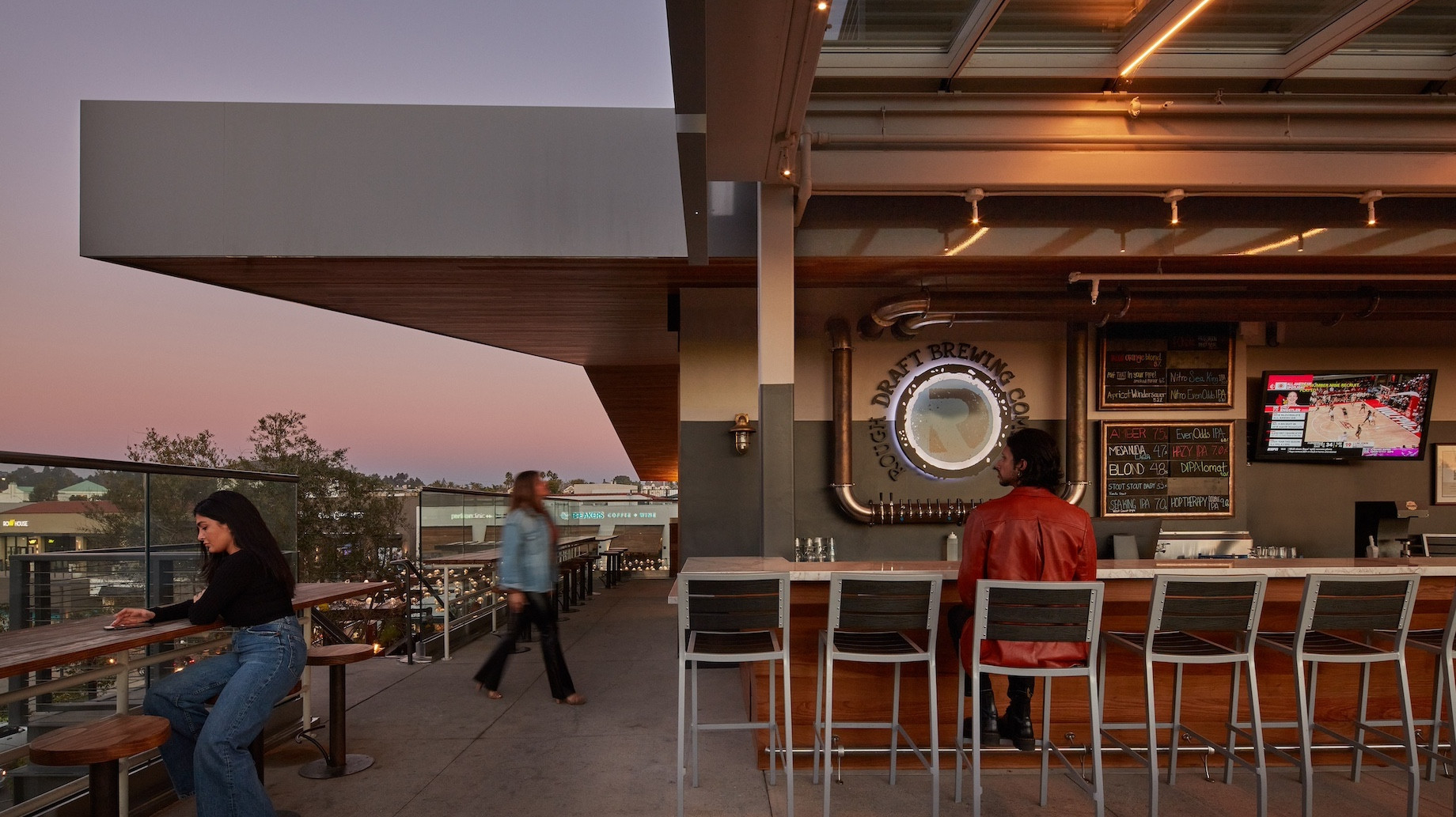Outdoor seating and rooftop bars are part of the draw at Sky Deck. The multilevel culinary destination has ramped up nighttim