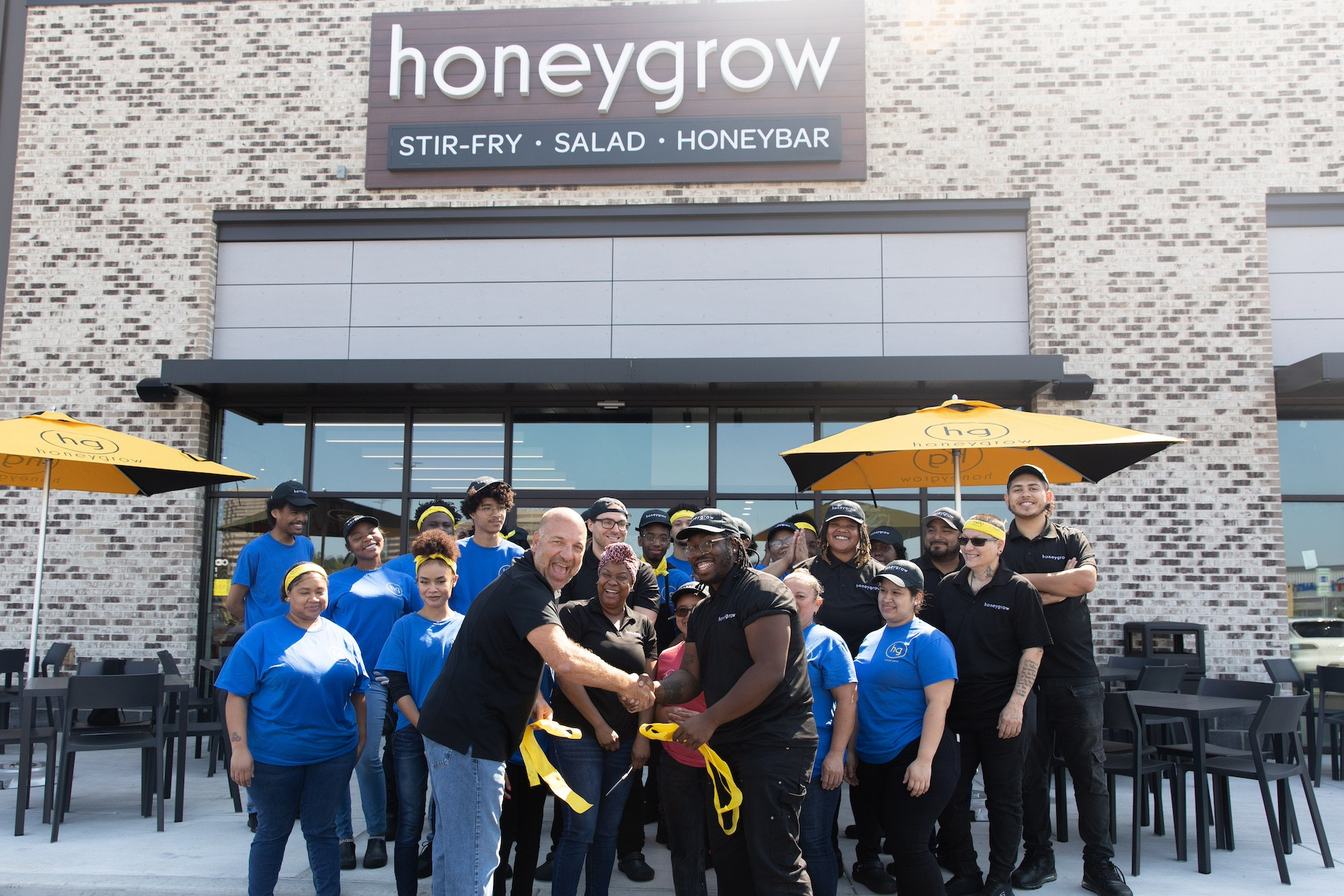 Employees celebrate the July 31, grand opening of Honeygrow’s Owings Mills, Maryland, location.