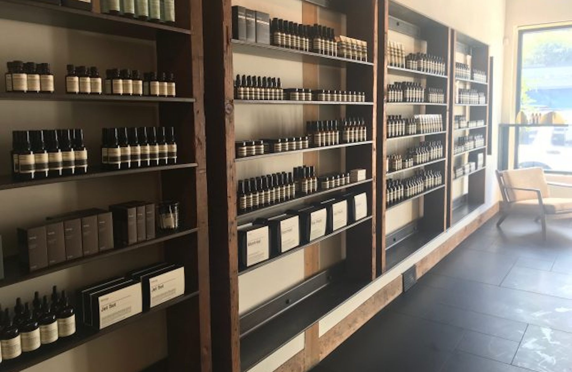 According to the webpage for Aesop’s Silver Lake store in Los Angeles: “Black basalt, Douglas Fir and gypsum panelling are ke