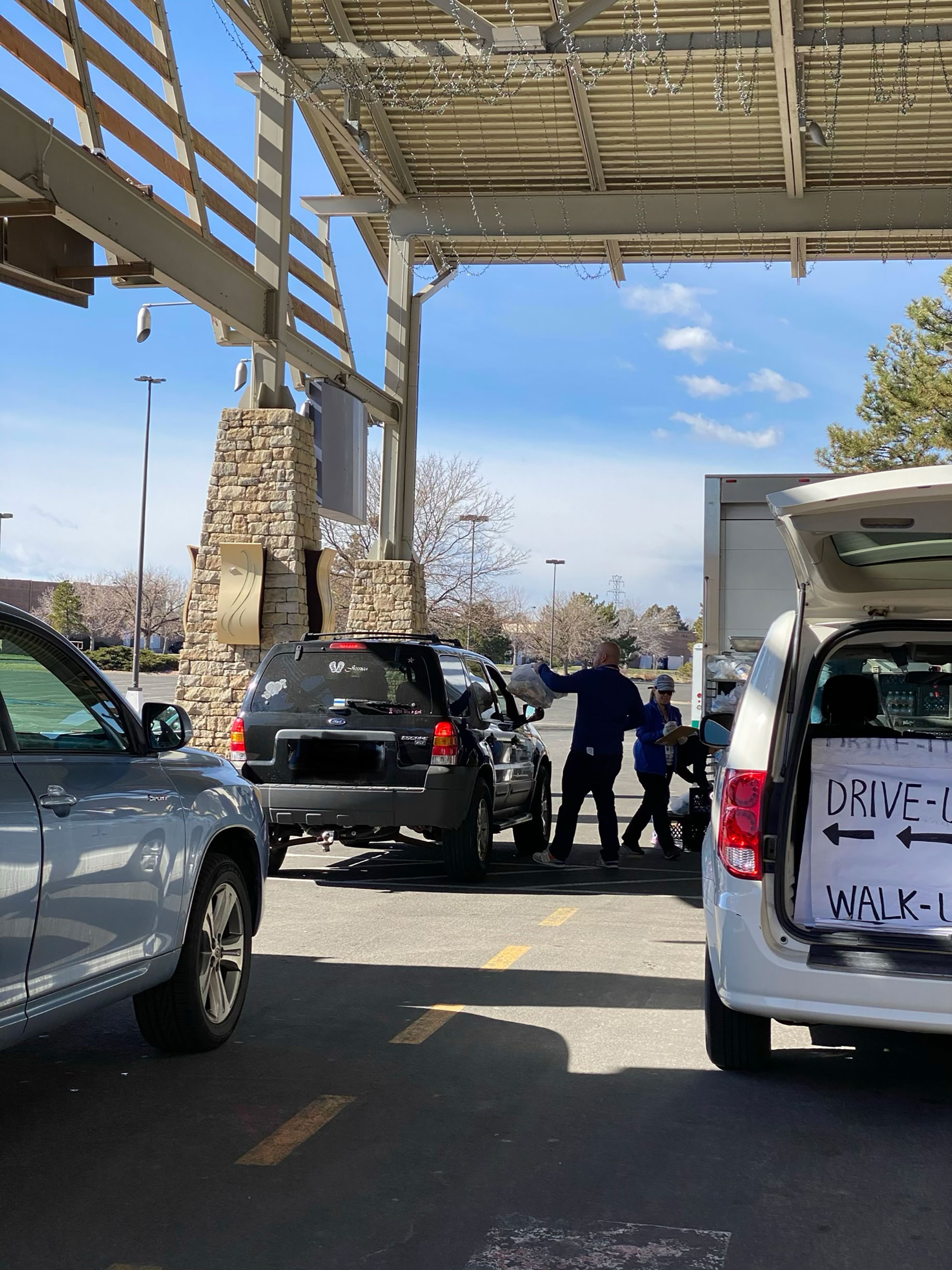 Now that schools are closed, Colorado's Aurora Public Schools distributes free student meals at many sites, including Wa
