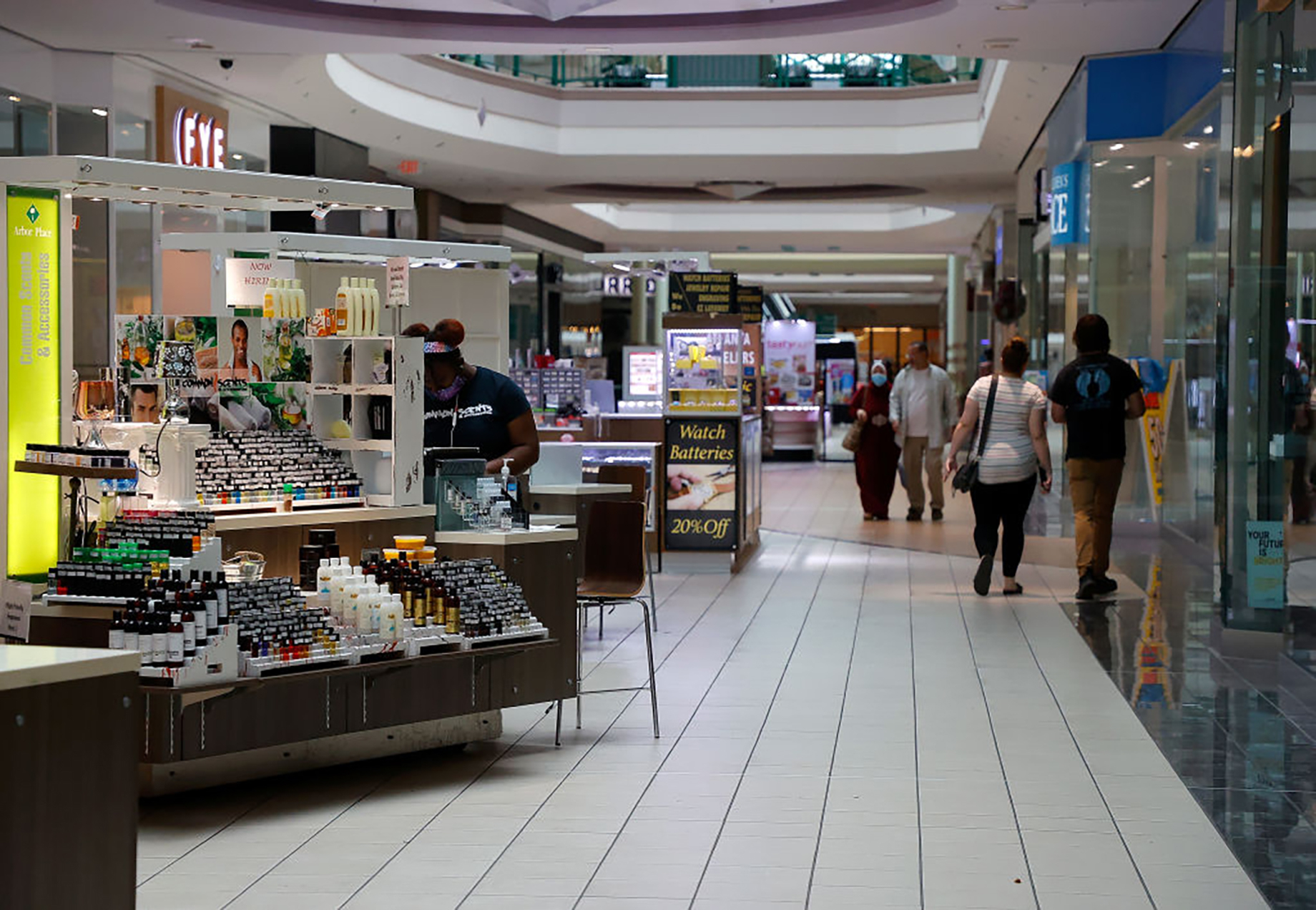 Patrons walk around Arbor Place, in Douglasville, Georgia, on May 4. The shopping center reopened on May 1 under strict guide