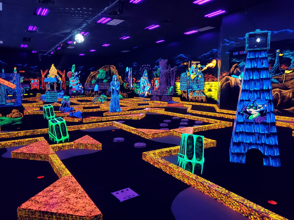 An 18-hole, glow-in-the-dark miniature golf course is the core of every Monster Mini Golf franchise location.